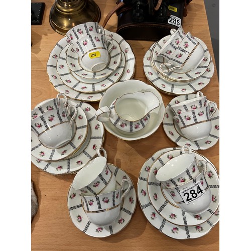 284 - 12 piece vintage china 'rose buds' tea set missing 2 tea plates