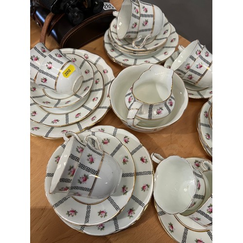 284 - 12 piece vintage china 'rose buds' tea set missing 2 tea plates