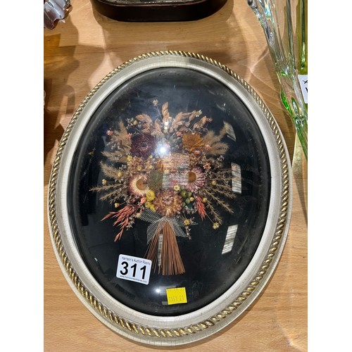 311 - Oval pressed flowers under glass