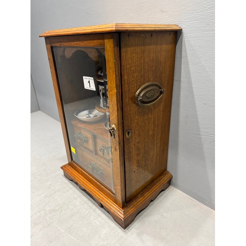 1 - Superb oak smokers cabinet circa 1920 with glass door & tobacco jar & trays