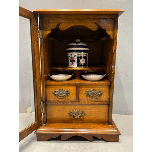 1 - Superb oak smokers cabinet circa 1920 with glass door & tobacco jar & trays