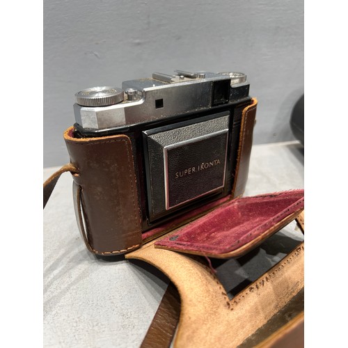 4 - Zeiss ikon camera in leather case + cased binoculars