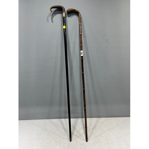 36 - 2 Walking sticks one with silver rim