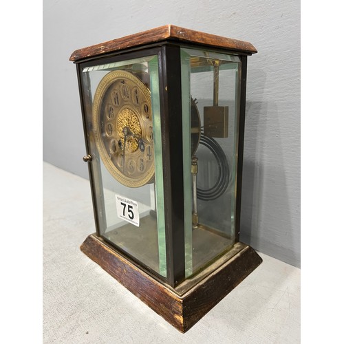 75 - Brass faced mantle clock in glass case