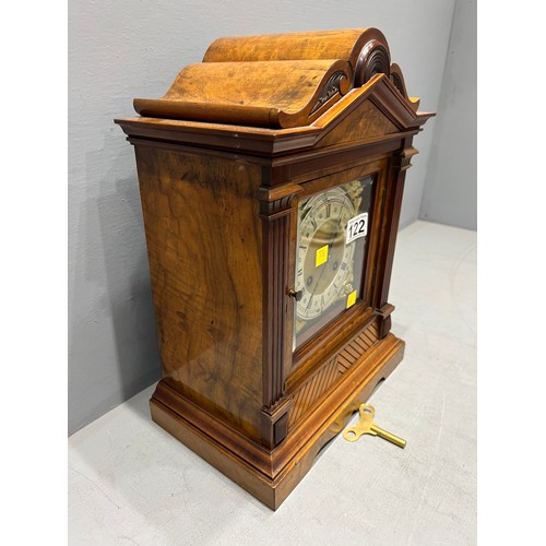 122 - Walnut cased mantle clock & key