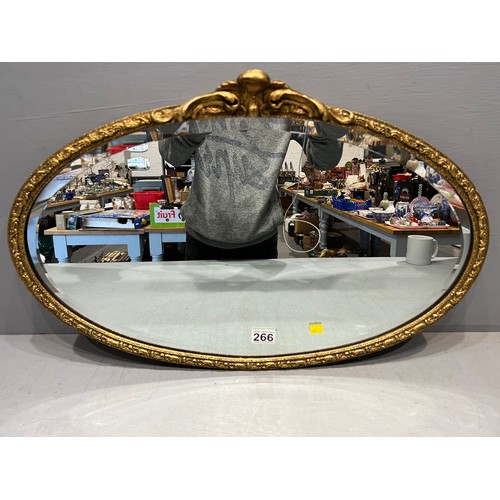 266 - Oval gilt framed bevel edge mirror