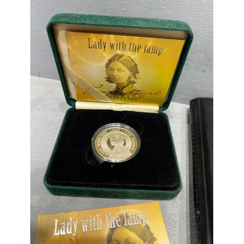 315 - Coins in wallet + lions silver proof coin + lady with lamp silver coin