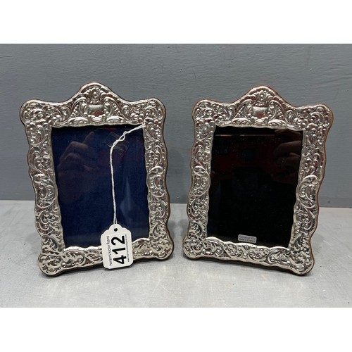 412 - Pair silver deco style photo frames