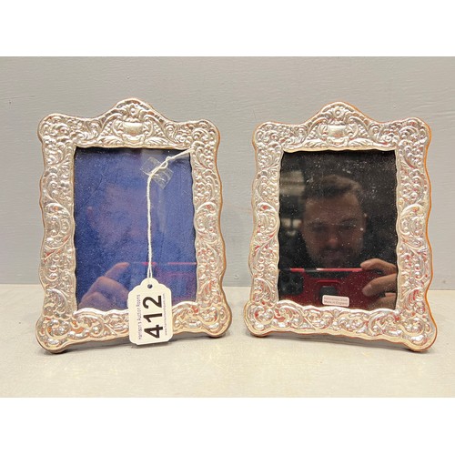 412 - Pair silver deco style photo frames