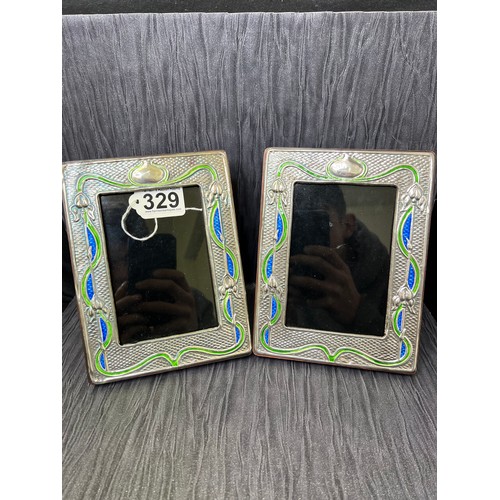 329 - Pair silver enamel nouveau photo frames