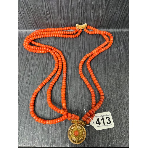 413 - 18ct Gold coral necklace