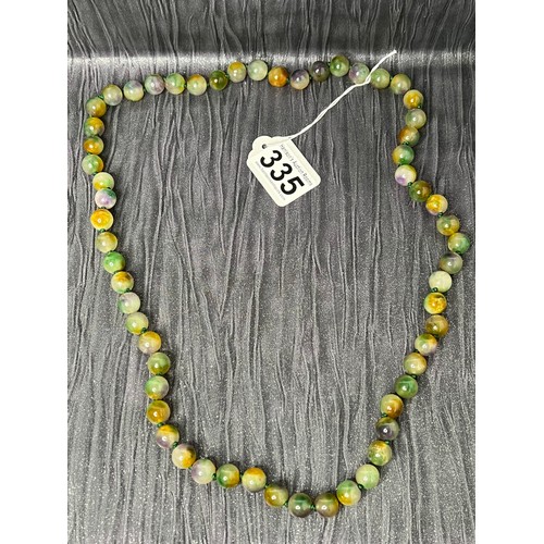 335 - String jade beads