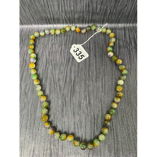 335 - String jade beads