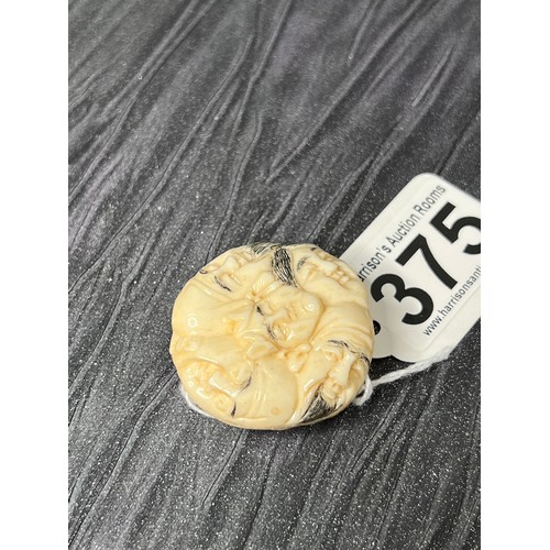 375 - Bone faces netsuke