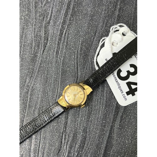 434 - 18ct Gold tudor ladies watches