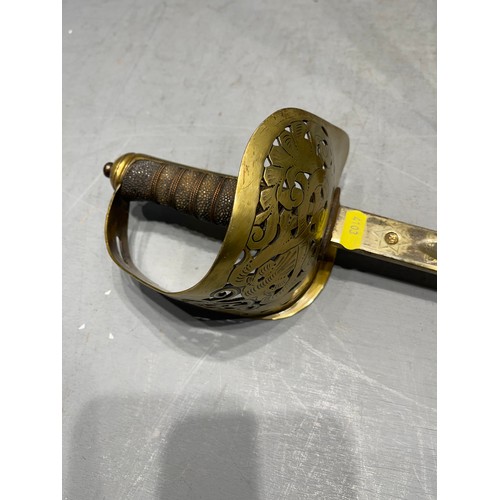 255J - 2 Military swords on in brass sheath