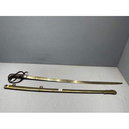 255J - 2 Military swords on in brass sheath