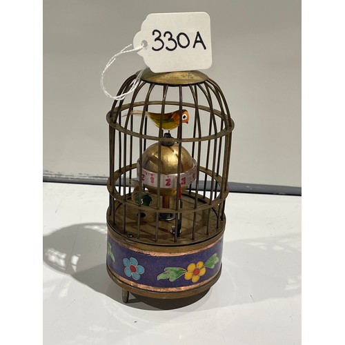 330A - Brass & enamel clock bird cage working both birds move when ticking away