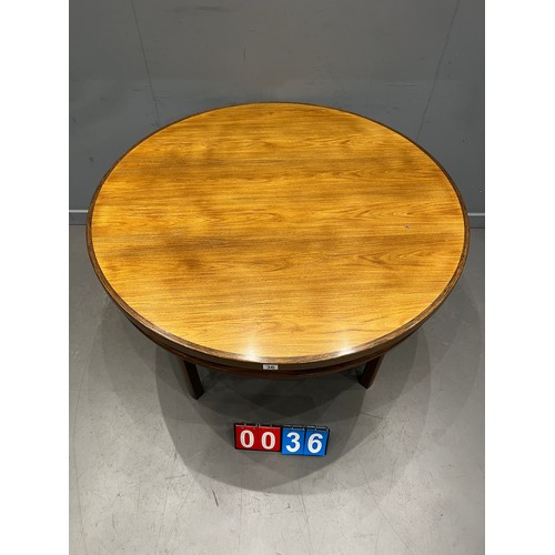 36 - Mid century teak tuxedo round dining table