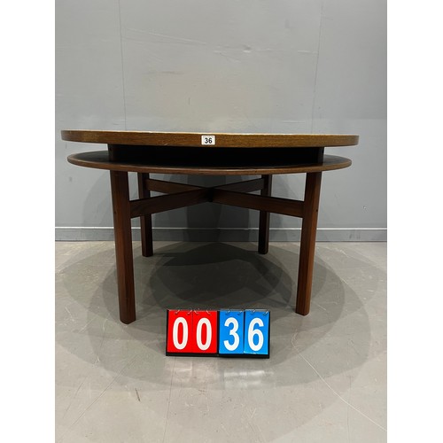 36 - Mid century teak tuxedo round dining table