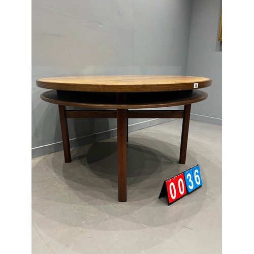 36 - Mid century teak tuxedo round dining table