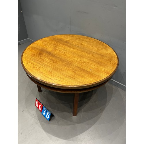 36 - Mid century teak tuxedo round dining table