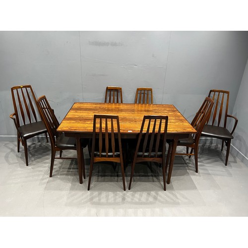 106 - Danish rosewood dining table by Arne vodder for Vamo sonderborg + 8 rosewood dining chairs by Niels ... 