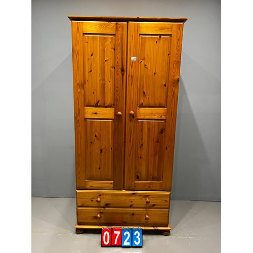 723 - Pine wardrobe over 2 drawers