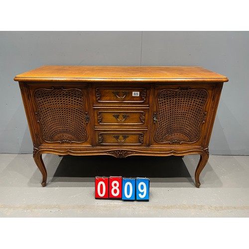 809 - French carved walnut sideboard with bergere doors