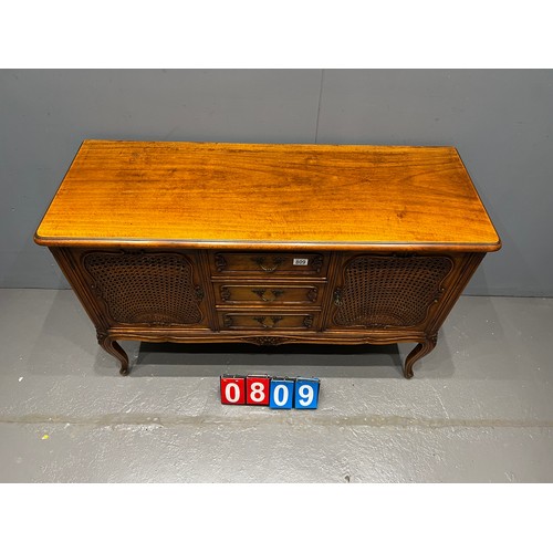 809 - French carved walnut sideboard with bergere doors