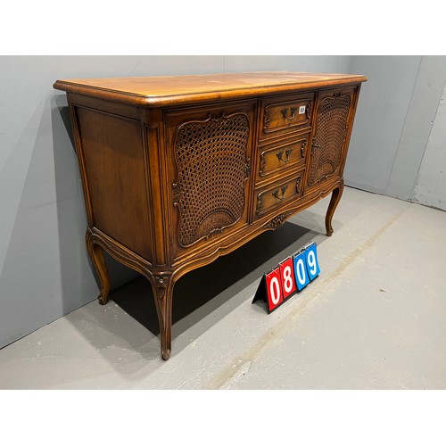 809 - French carved walnut sideboard with bergere doors