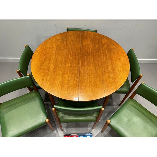 859 - Mid century round extending dining table & 6 chairs