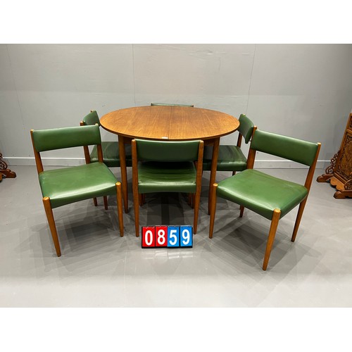 859 - Mid century round extending dining table & 6 chairs