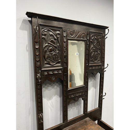 896 - Oak Victorian green man style carved mirror back coat stand