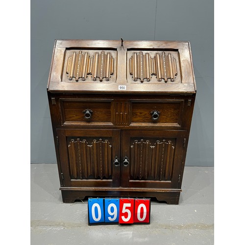 950 - Old charm design linenfold front leather top bureau