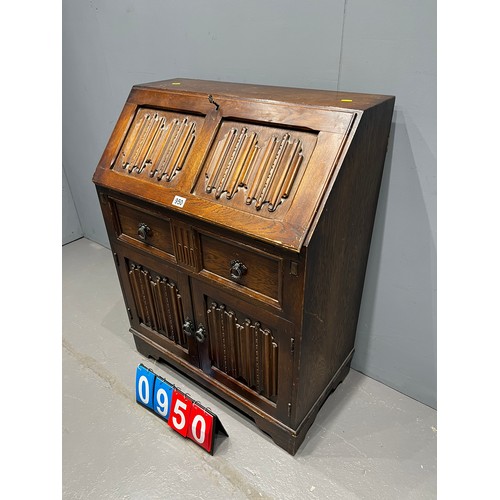 950 - Old charm design linenfold front leather top bureau