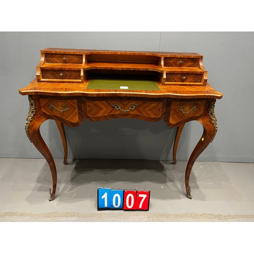 1007 - French style reproduction leather top desk with gilt ormolu