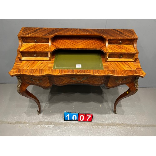 1007 - French style reproduction leather top desk with gilt ormolu