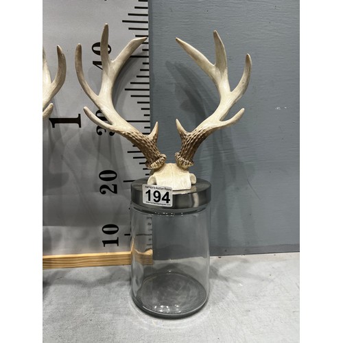 194 - Pair glass jars with antler tops