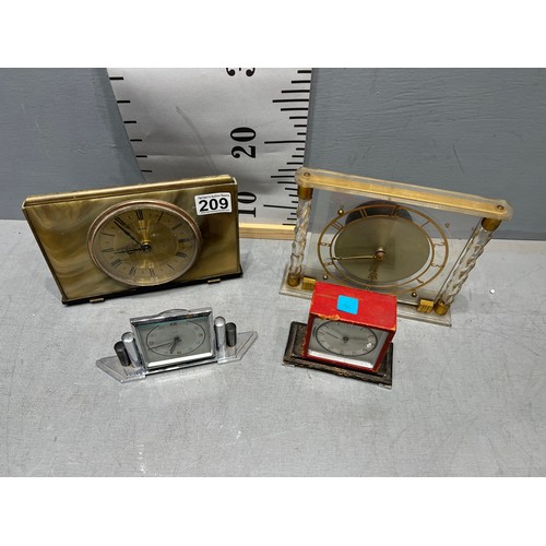 209 - 4 Assorted clocks