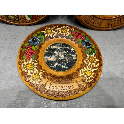 304 - 3 Wooden carved & painted plates/plaques