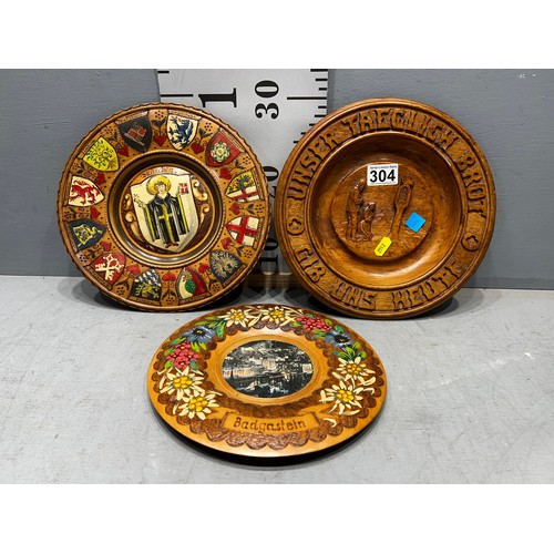 304 - 3 Wooden carved & painted plates/plaques