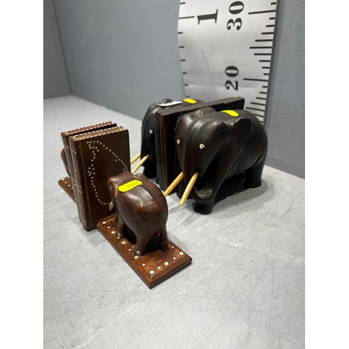 305 - Pair ebony elephant book ends + smaller pair inlaid elephant bookends