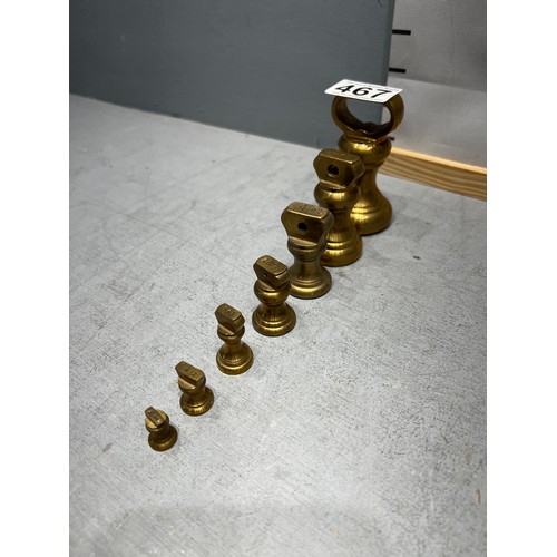 467 - Set 7 brass vintage bell weights