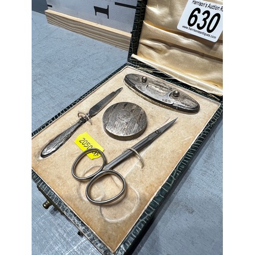 630 - Silver manicure set in case (scissors not silver)