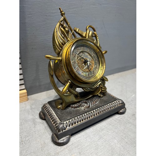 638 - Ships wheel & anchor clock by the British united clock co UK Birmingham needs clean