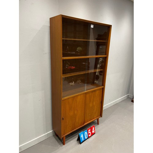 1054 - Herbert Gibbs teak mid century sliding door bookcase