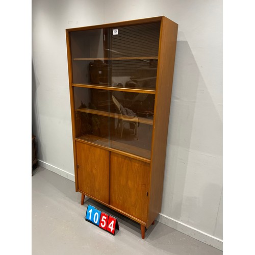 1054 - Herbert Gibbs teak mid century sliding door bookcase