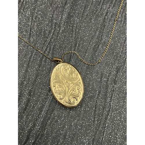 533 - 9ct gold locket and chain  10.6g