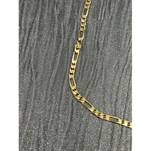 550 - 9ct gold neck chain. 23.5